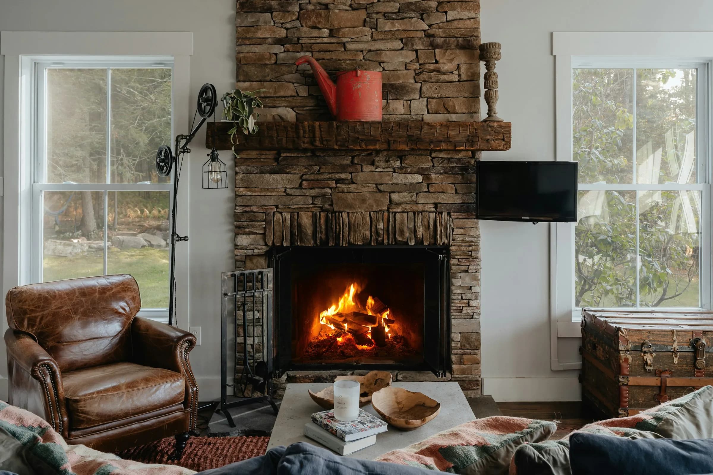 Sitting room with a fireplace and wooden furniture
